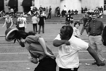 black and white people fighting
